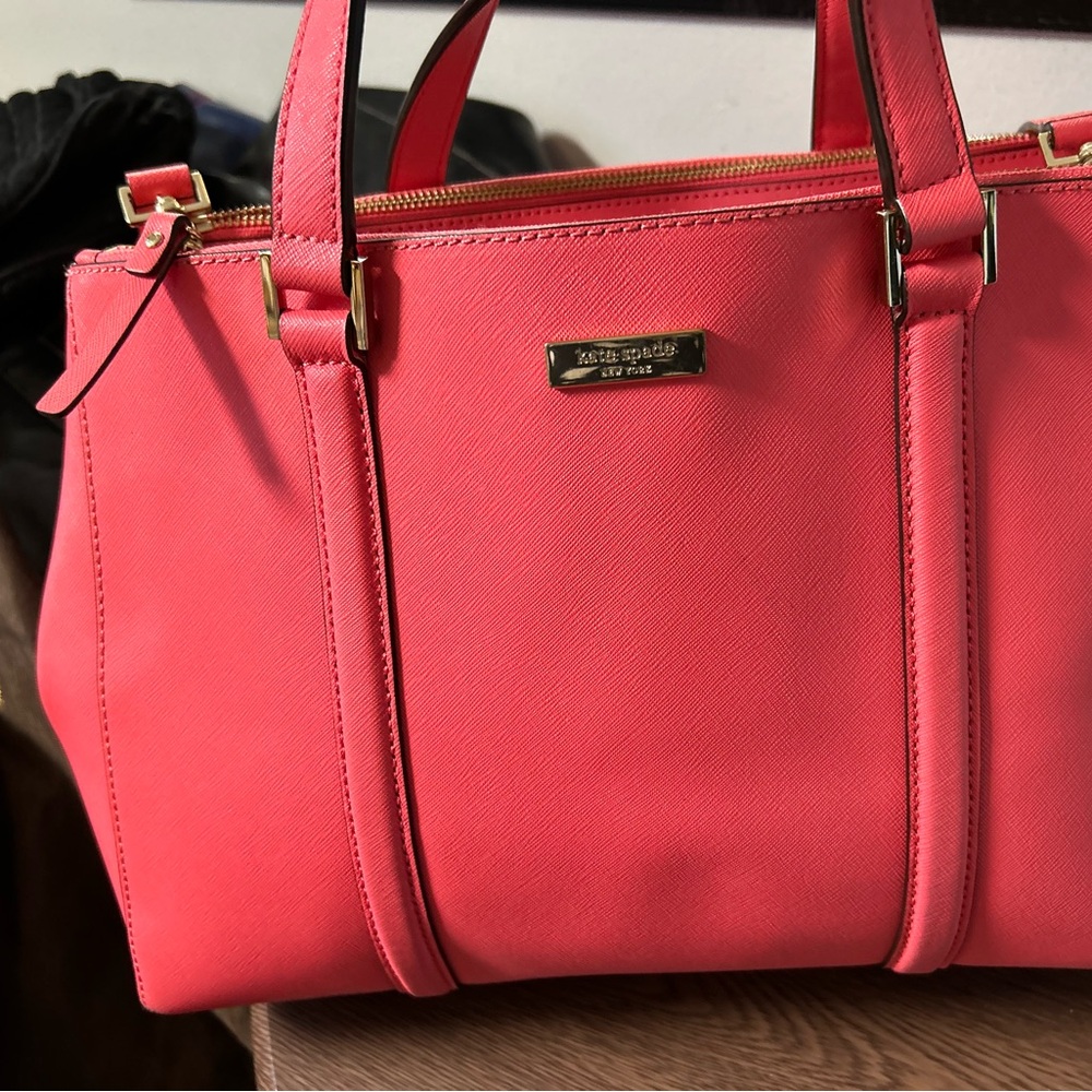 Kate Spade large Coral/pink handbag with dust cover. Paid $298